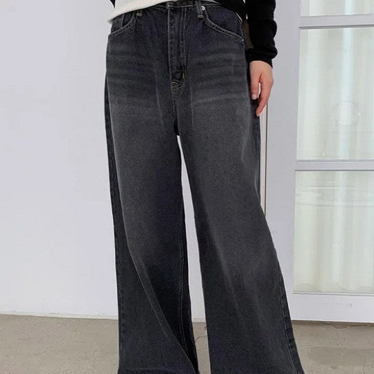 Washed And Worn Wide Leg Jeans With Bow Print At The Back