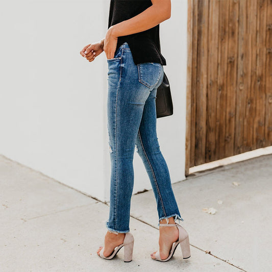 Stretch jeans with holes