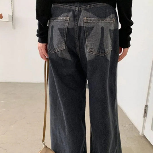 Washed And Worn Wide Leg Jeans With Bow Print At The Back