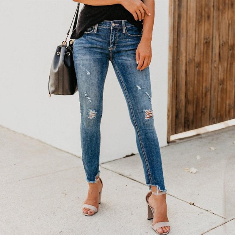 Stretch jeans with holes