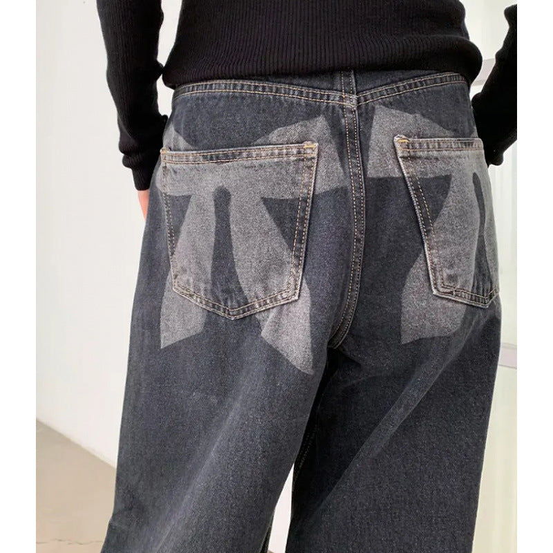Washed And Worn Wide Leg Jeans With Bow Print At The Back