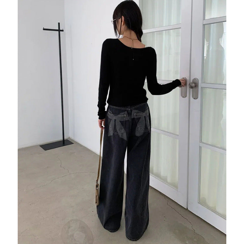 Washed And Worn Wide Leg Jeans With Bow Print At The Back